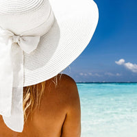 DRESHOW Womens Big Bowknot Straw Hat Foldable Sun Hats Floppy Beach Hat Large Roll up Cap UPF 50+