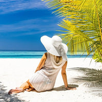 DRESHOW Womens Big Bowknot Straw Hat Foldable Sun Hats Floppy Beach Hat Large Roll up Cap UPF 50+